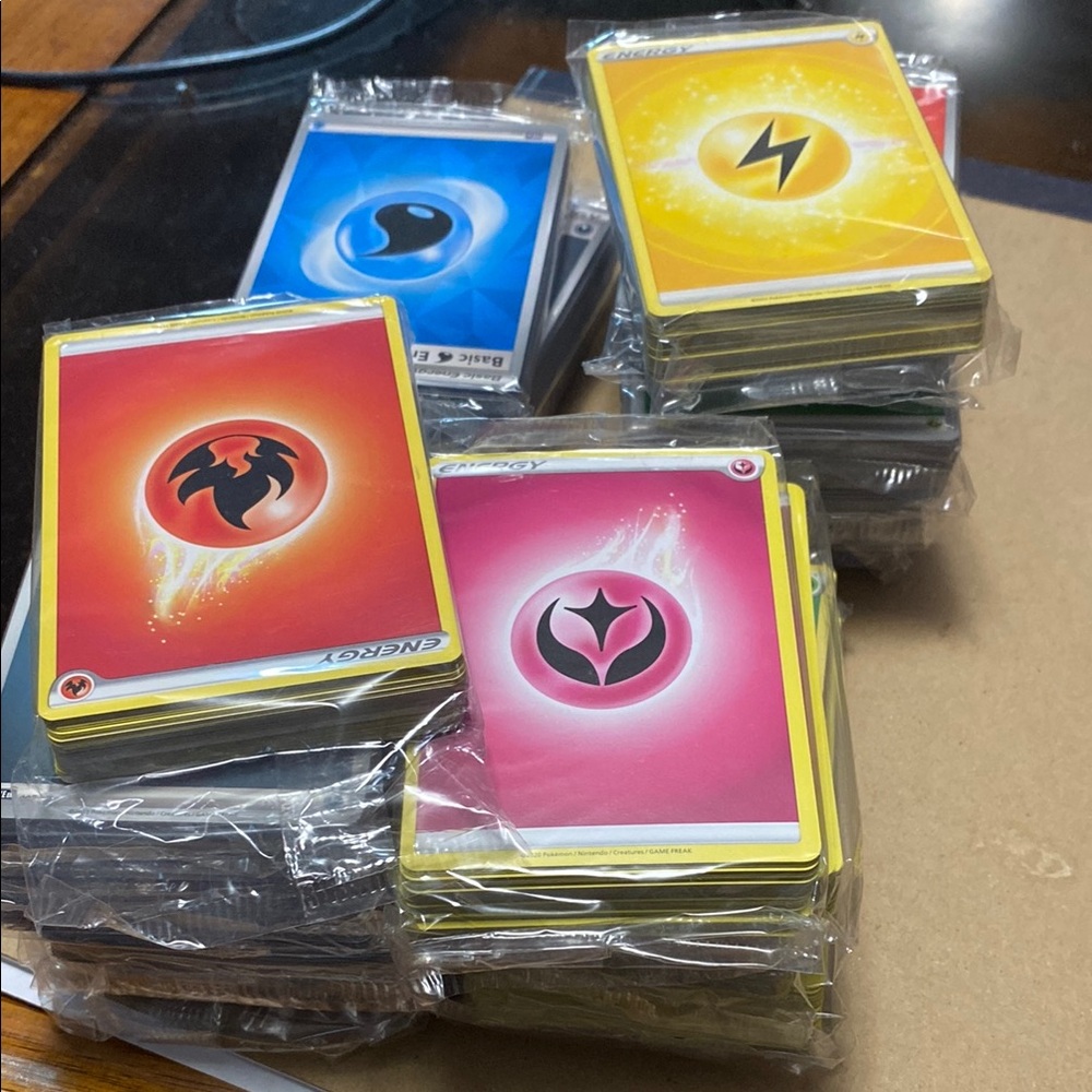 17 packs of Pokemon energy cards